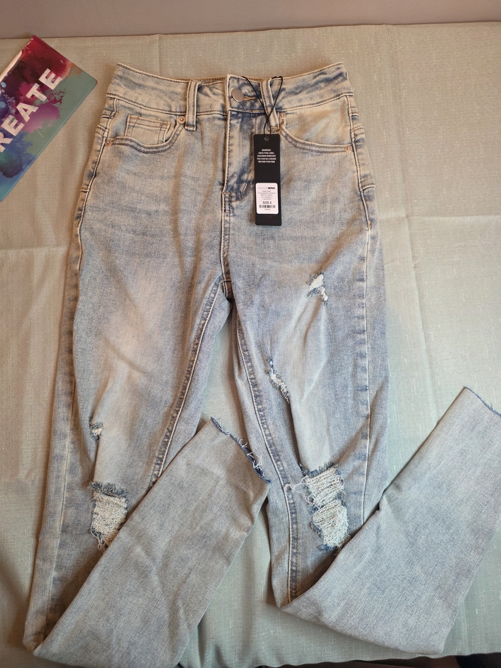 Fashion Nova Light Blue Distressed Skinny Jeans